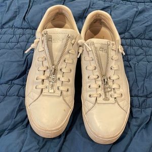 White platform Ash sneakers size 41. Red star on the back of each heel.